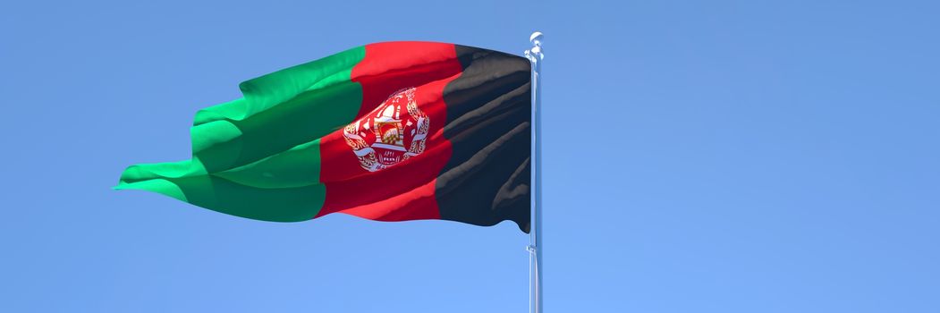 3D rendering of the national flag of Afghanistan waving in the wind against a blue sky