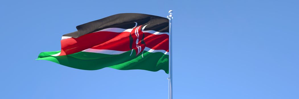 3D rendering of the national flag of Kenya waving in the wind against a blue sky