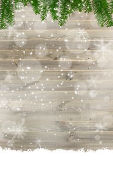 Christmas white rustic background. Vintage planked wood with Christmas tree branches, snowflakes. Place for text, illustration