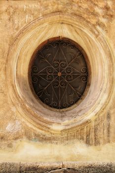 Old stone rosette with forged metal details, Castile-La Mancha, Spain