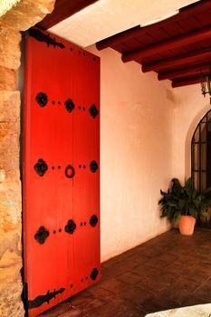 Typical and colorful andalusian house portal in Cordoba
