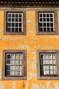 Beautiful and old colorful tiled facades in Porto city in January
