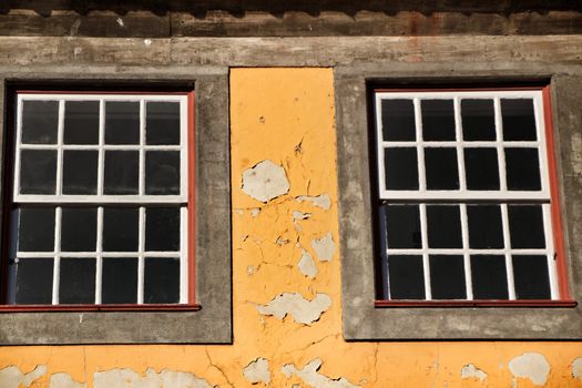 Beautiful and old colorful tiled facades in Porto city in January