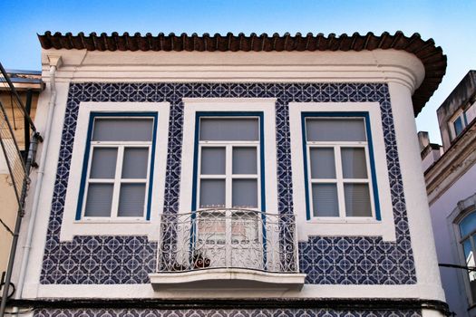 Beautiful and old colorful typical facade next to the water canal in Aveiro village in January