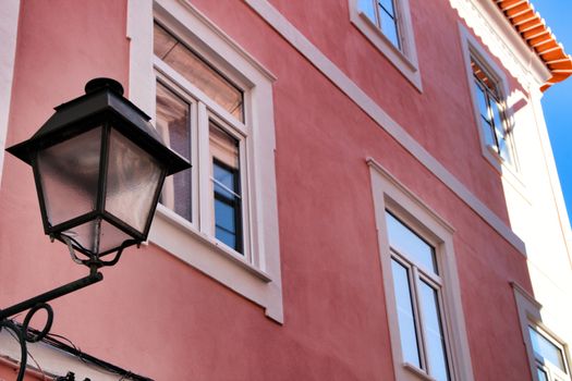 Beautiful and old colorful typical facade next to the water canal in Aveiro village in January