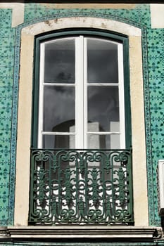 Old colorful and bright typical facade in Lisbon