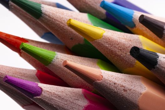 A group of colored pencils in diagonal macro view