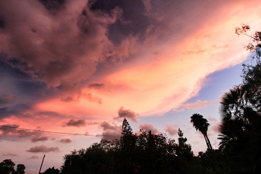 Pink Clouds and lovely sky at Sunset in Alicante in summer