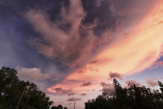 Pink Clouds and lovely sky at Sunset in Alicante in summer