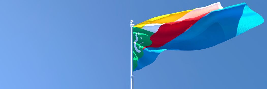 3D rendering of the national flag of Comoros waving in the wind against a blue sky