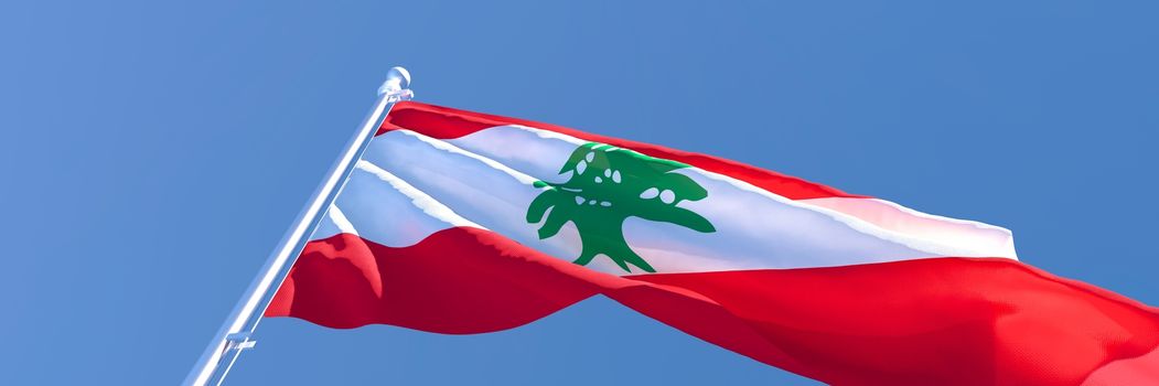 3D rendering of the national flag of Lebanon waving in the wind against a blue sky