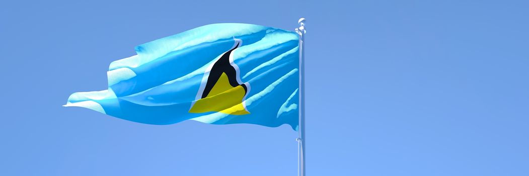 3D rendering of the national flag of Saint Lucia waving in the wind against a blue sky
