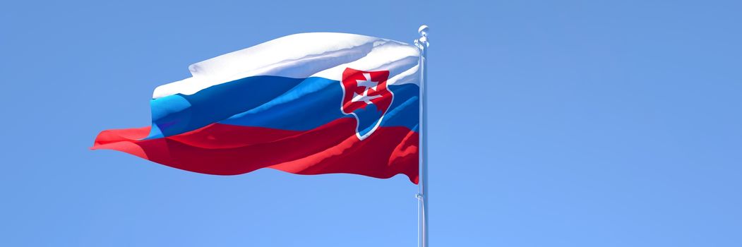 3D rendering of the national flag of Slovakia waving in the wind against a blue sky