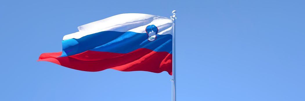 3D rendering of the national flag of Slovenia waving in the wind against a blue sky