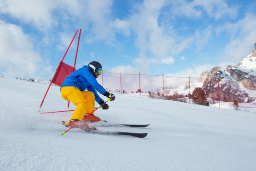 Gs Giant Slalom alpine ski racer skiing down the slope with gates sport winter training at Col Gallina Cortina d'Ampezzo Dolomites