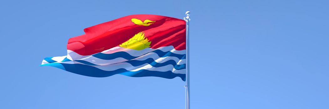 3D rendering of the national flag of Kiribati waving in the wind against a blue sky