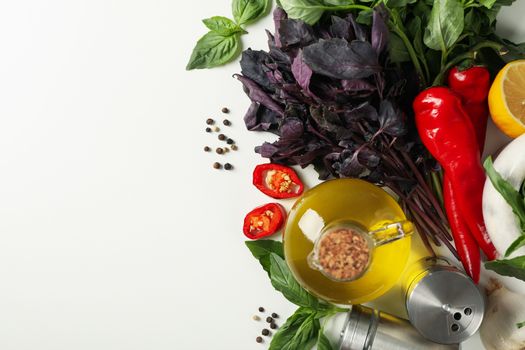 Different spices and herbs on white background, top view