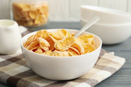 Concept of breakfast with muesli on wooden table