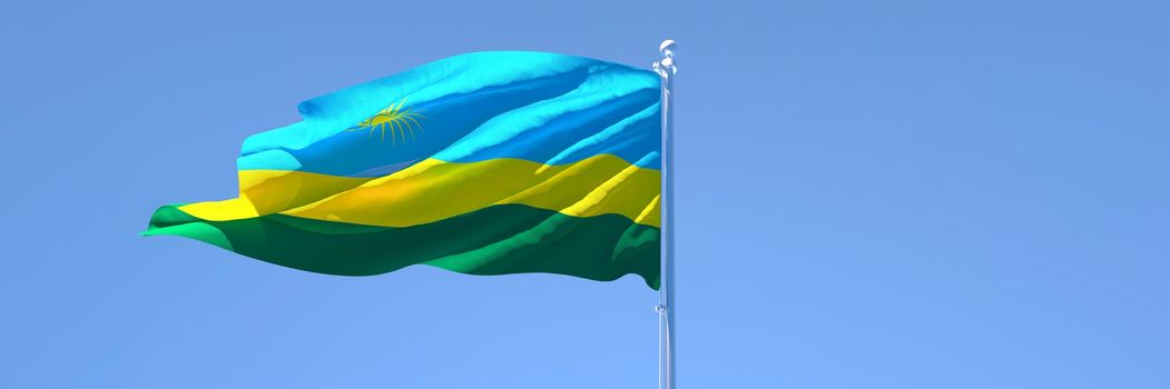 3D rendering of the national flag of Rwanda waving in the wind against a blue sky