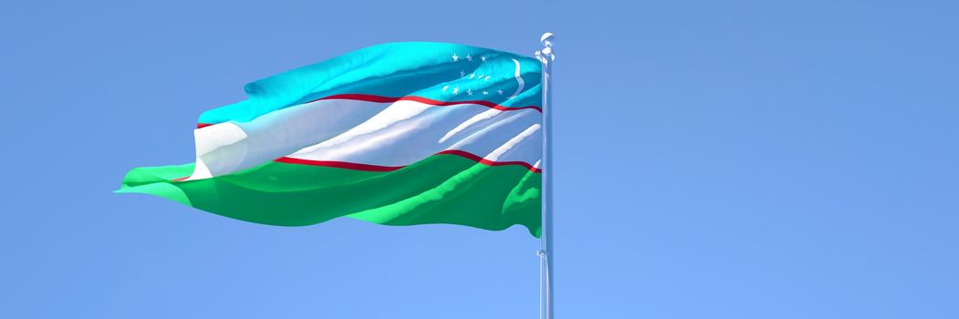 3D rendering of the national flag of Uzbekistan waving in the wind against a blue sky