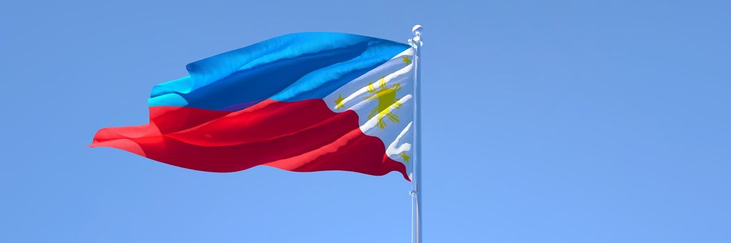 3D rendering of the national flag of Philippines waving in the wind against a blue sky