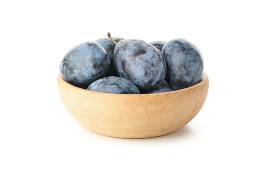 Bowl with plums isolated on white background