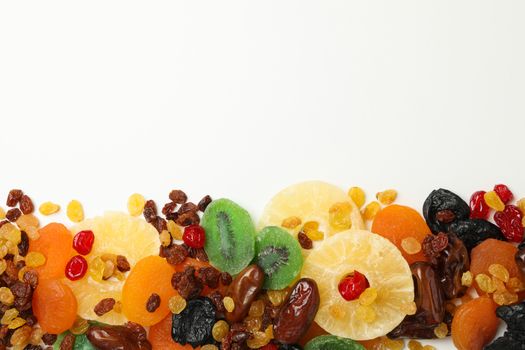 Dried fruits on white background, top view and space for text