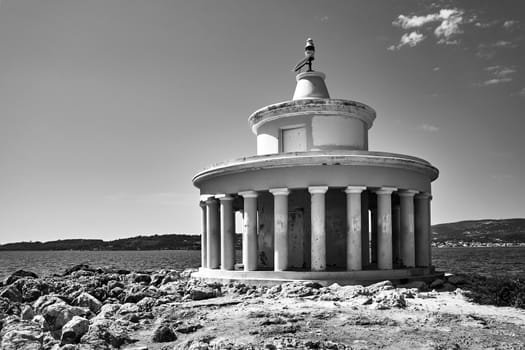 A stately agave on the shores of Paliki Bay on the island of Kefalonia, Greece, black and white