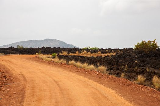 Red road in the savannah, safari in Kenya