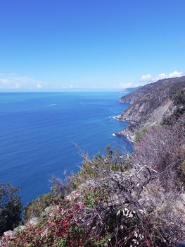 Cinque Terre, Italy - 09/02/2020: Beautiful landscape of a coastal fishing village, amazing view on many little colorful houses, traditional architecture of the little Italian town called Cinque Terre