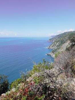 Cinque Terre, Italy - 09/02/2020: Beautiful landscape of a coastal fishing village, amazing view on many little colorful houses, traditional architecture of the little Italian town called Cinque Terre