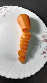 Fresh and delicious and healthy carrots on the plate