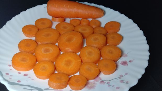 Fresh and delicious and healthy carrots on the plate