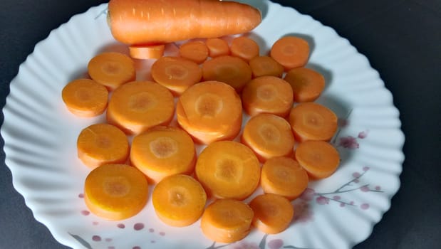 Fresh and delicious and healthy carrots on the plate