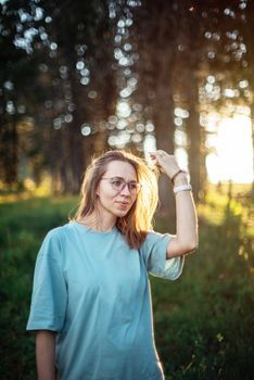 Healthy lifestyle woman walking in mountains in summer forest area