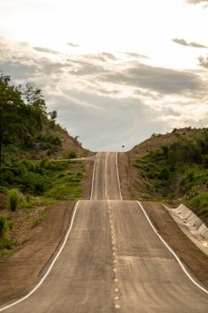 Beautiful empty rural curve, asphalt road way.