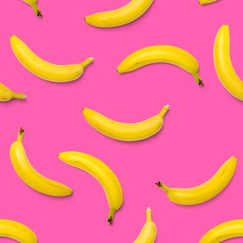 Bananas seamless pattern. pop art bananas pattern. Tropical abstract background with banana. Colorful fruit pattern of yellow banana on pink background, flat lay