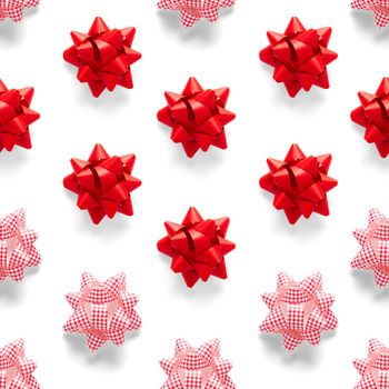 Seamless regular creative Christmas pattern with New Year decorations on white background. xmas Modern Seamless pattern made from christmas decorations. Photo quality pattern for fabric, prints, wallpapers, banners or creative design works.