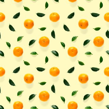 Mandarin seamless pattern, tangerine, clementine isolated on yellow background with green leaves. Collection of fine Mandarine seamless patterns.