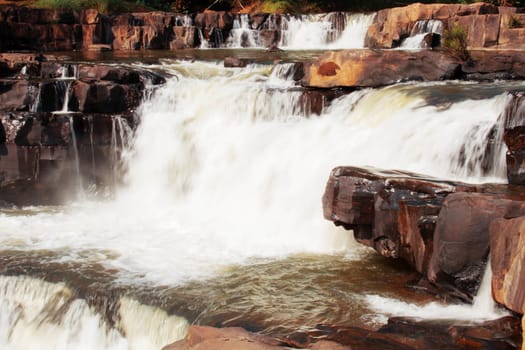 White water and rock with the beautiful of waterfall.