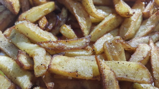 Potato fried or roasted slices on clean background with copy space for text