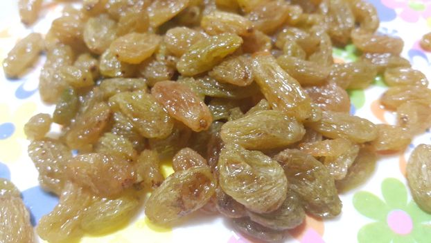 Closeup view of dried or dehydrated fresh green raisins