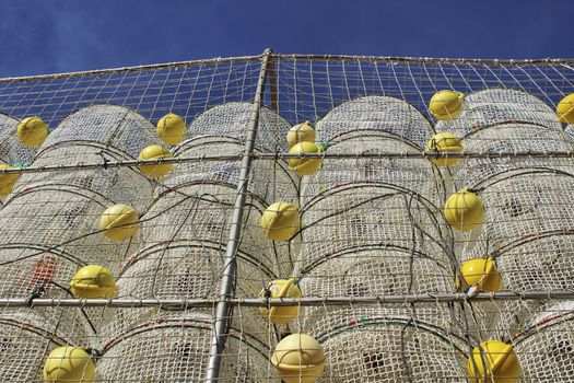 Cages to catch seafood stacked in the port of Santa Pola, Alicante Spain