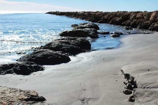 Sunny day on the beach in winter in Santa Pola, Alicante