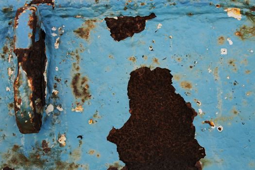 Rusty metal surface on a fishing boat in Santa Pola