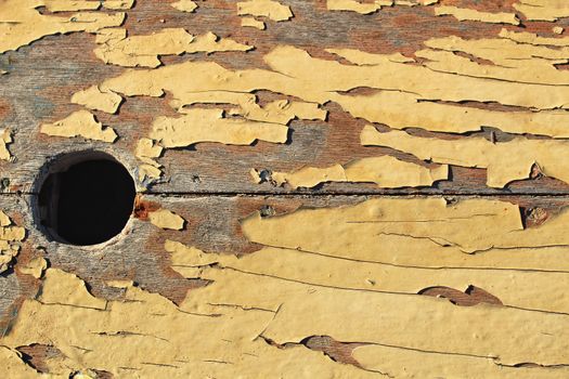 Old wooden board painted yellow texture