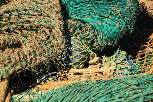 Fishing nets background and colorful buoys in the port of Santa Pola, Alicante
