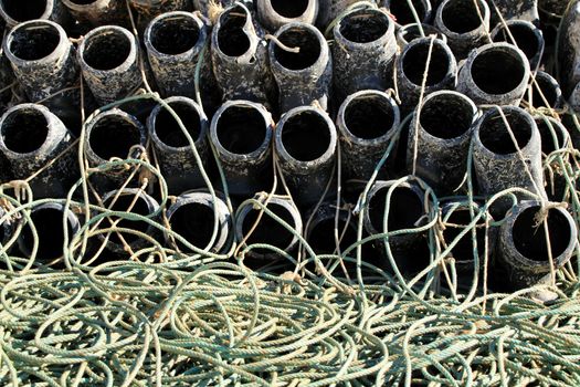 Traps to fish octopus and nets in the pier of Santa Pola, Spain