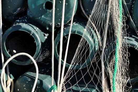 Traps to fish octopus and nets in the pier of Santa Pola, Spain