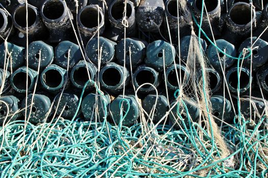 Traps to fish octopus and nets in the pier of Santa Pola, Spain